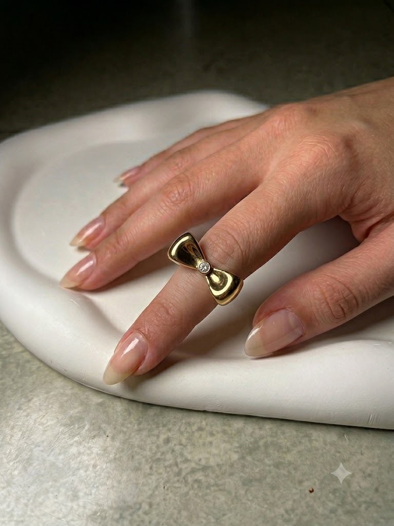 Golden bow ring